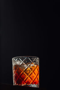 Close-up of drink against black background