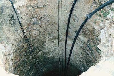 High angle view of water flowing through rocks