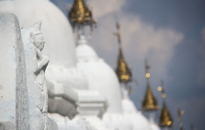 Close-up of cross during winter