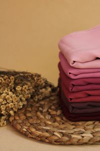 Close-up of cupcakes on table against wall