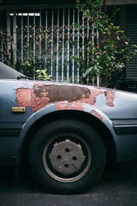 Close-up of vintage car on street