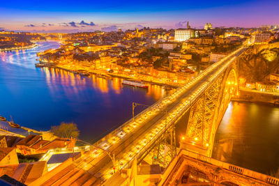 High angle view of illuminated buildings in city