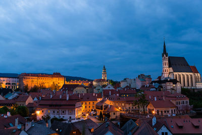 View of illuminated buildings in city