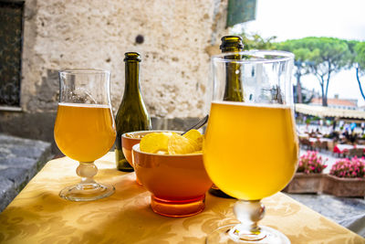 Close-up of beer glass on table