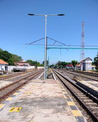 Railroad track against clear sky