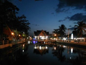 Reflection of illuminated buildings in water at night