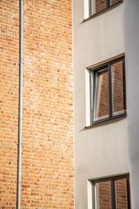 Low angle view of window on wall