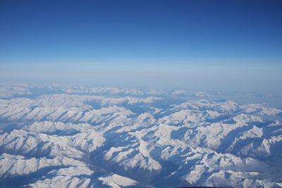 Aerial view of snow covered landscape