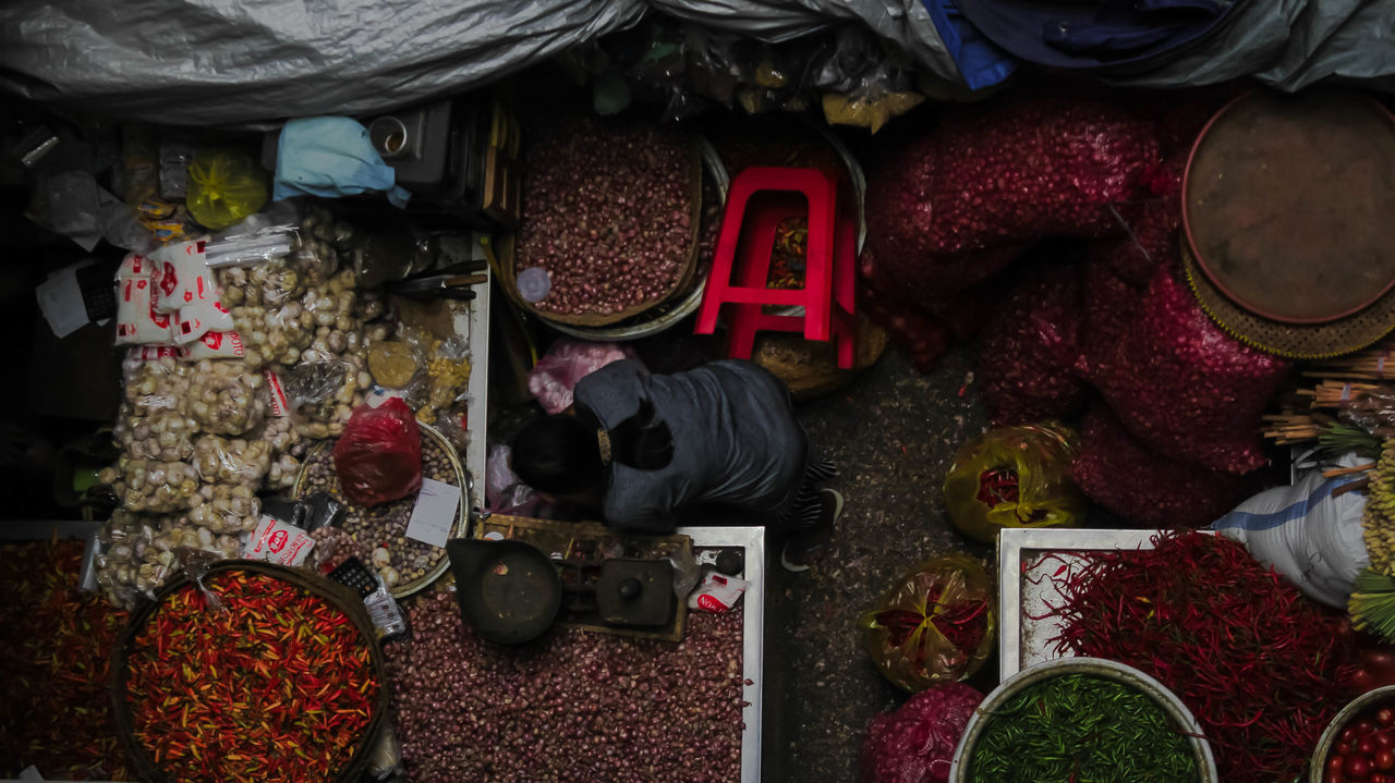 HIGH ANGLE VIEW OF SPICES FOR SALE IN MARKET