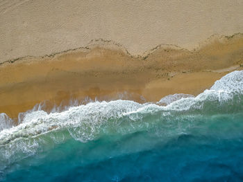 Sea waves splashing on shore