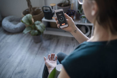 Woman checking blood pressure