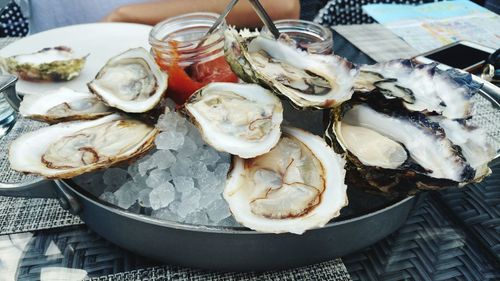 Close-up of in oysters in plate