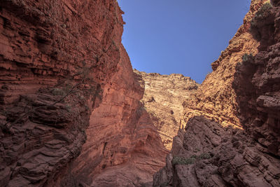 Low angle view of rocky mountains