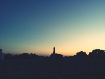 View of built structures against clear sky