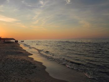 Scenic view of sea at sunset