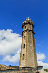 Low angle view of lighthouse against sky