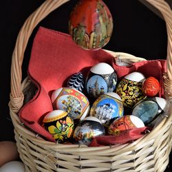 High angle view of multi colored eggs in basket