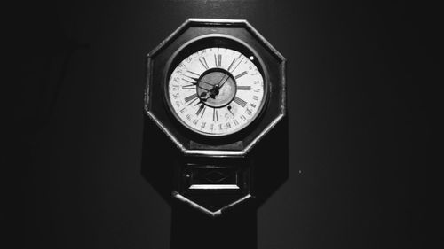 Clock over white background