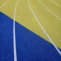 Running track color blue yellow