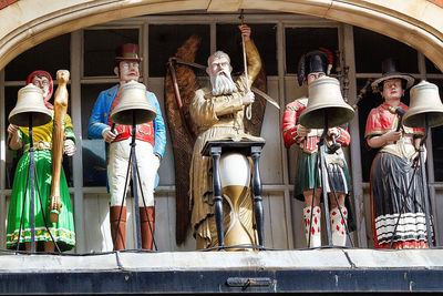 Statue in front of building