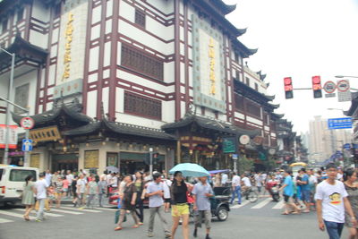 People walking on city street