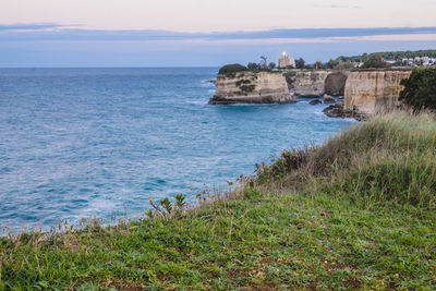 Scenic view of beach and sea against sky 