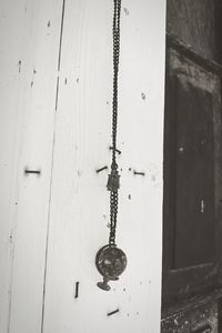 Close-up of door knocker on wall