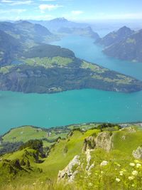 Scenic view of mountains and sea against sky