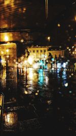 Illuminated buildings in city at night