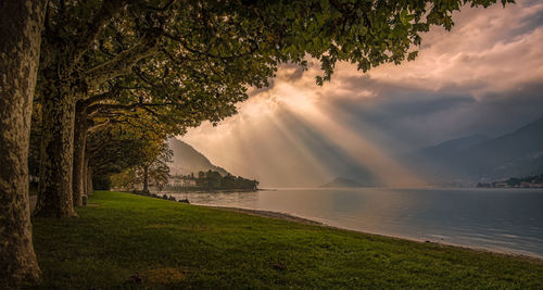 Scenic view of lake against sky during sunset