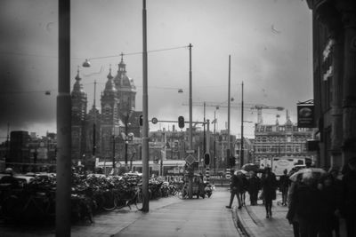 People walking on street in city