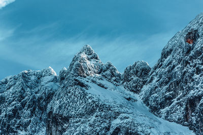 Snow covered mountain against sky