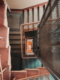 Directly below shot of spiral staircase of building