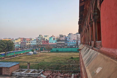 Exterior of buildings in city against clear sky