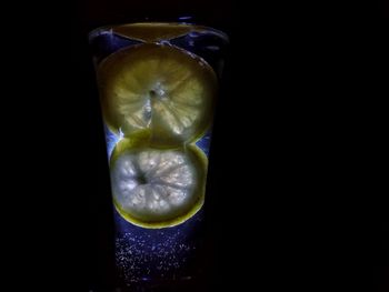Close-up of drink against black background