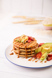 Close-up of food in plate on table