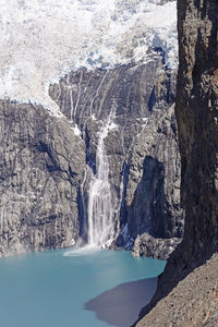 Ice fall into glacial lake suchia in the patagonian andes in  argentina