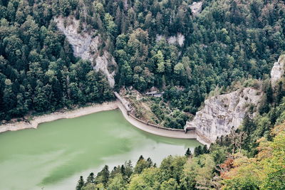 Dam and barraged lake in mountainous terrain