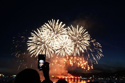 Firework display at night