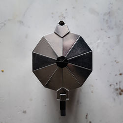 High angle view of umbrella on wall