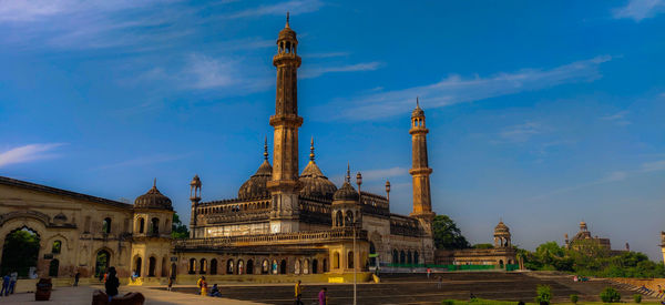 View of temple building against blue sky