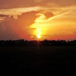 Scenic view of silhouette landscape against sky during sunset