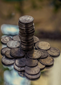 High angle view of coins on table