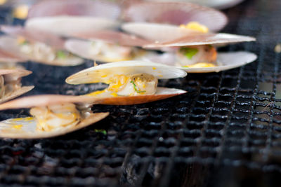 Close-up of mushrooms on barbecue grill