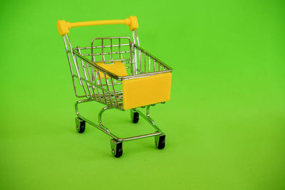 Metallic structure against green background