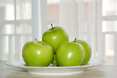 Close-up of fruits in bowl on table