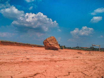 Rock formations in desert against sky