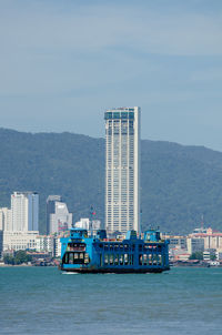 Nautical vessel on sea against sky