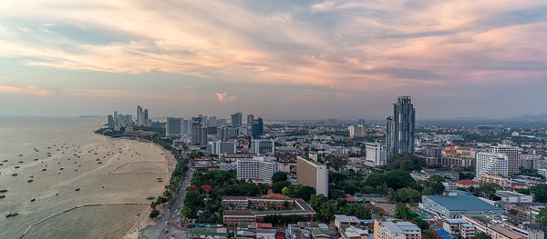 High angle view of city buildings during sunset