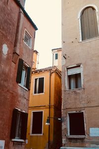 Low angle view of old building against sky